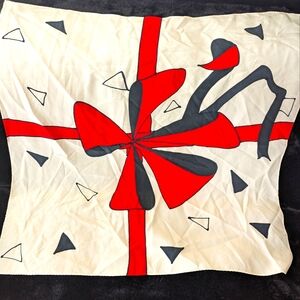 Besley's Chicago  28" x 28". Cream/Red bow/black triangles